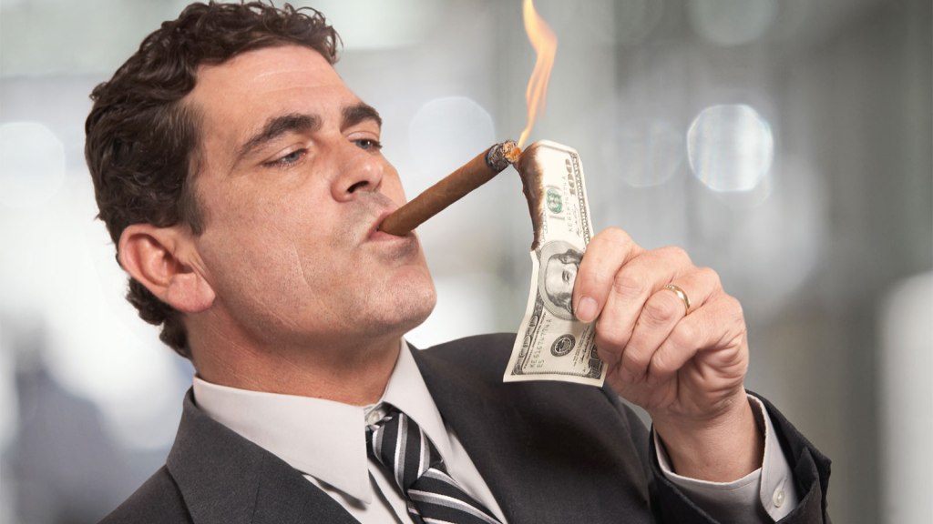 lighting-cigar-with-cash.jpg