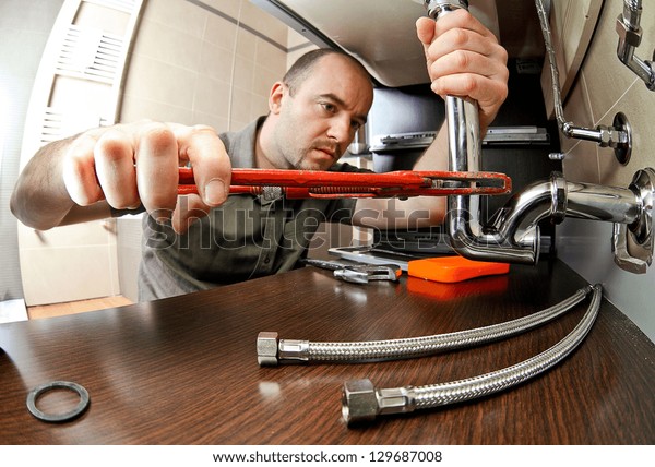 portrait-caucasian-plumber-work-600w-129687008.jpg